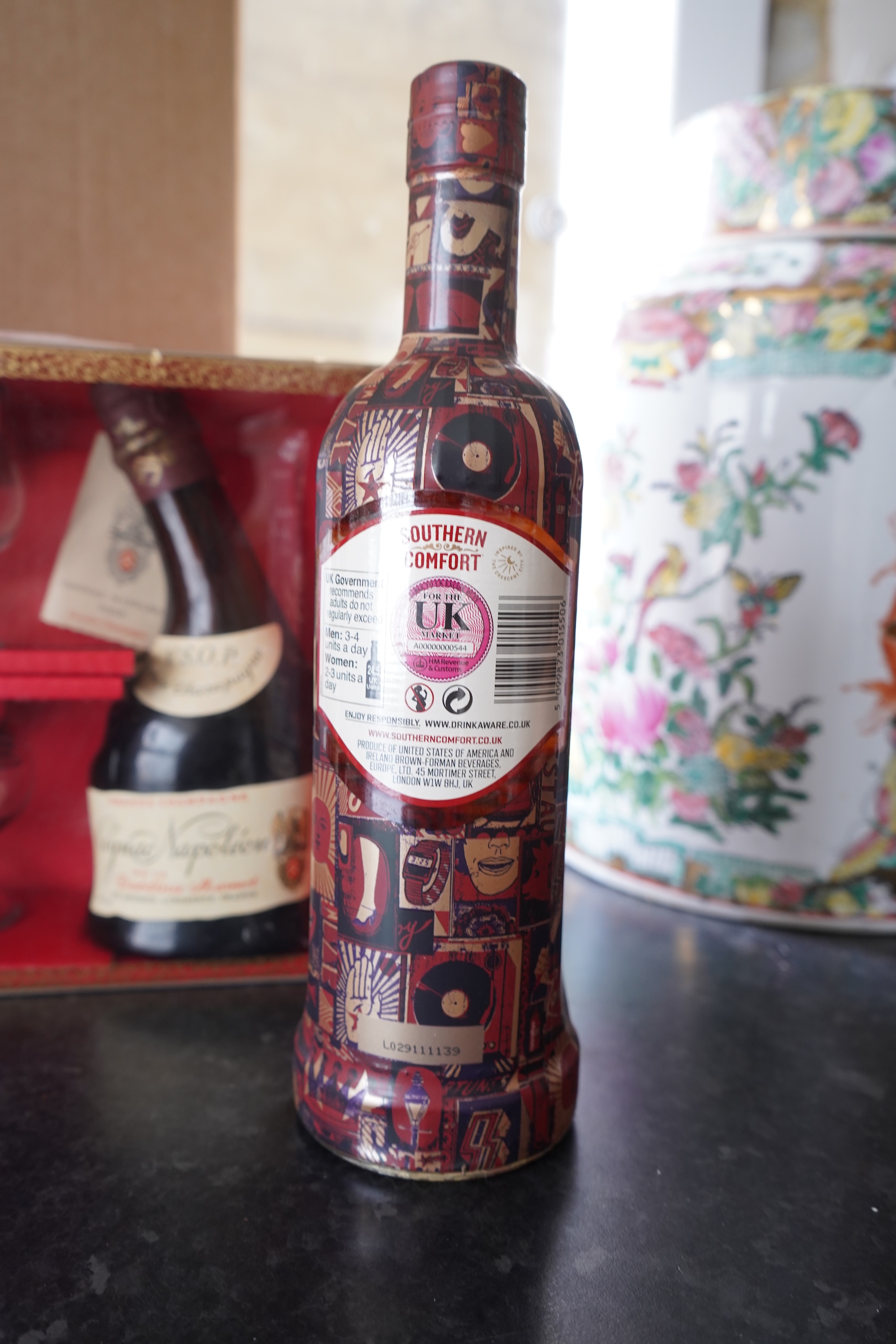 Six bottles of spirits and liqueurs, including whiskey and gin